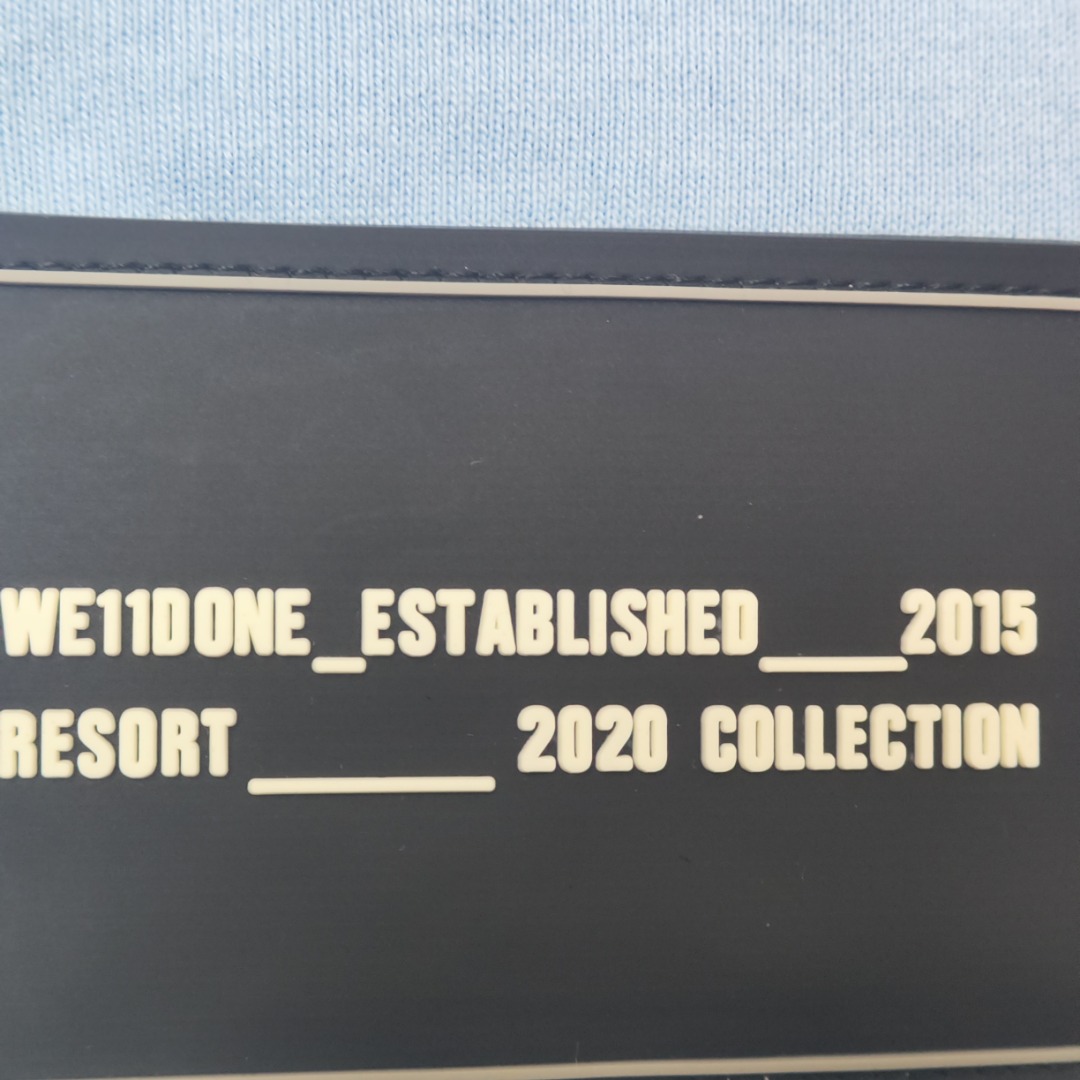 WE11D0NE Embroidered Logo Simple Color T-Shirt